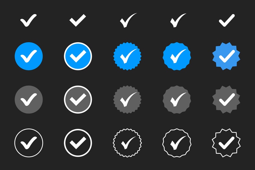 NFTs. A series of social media "verified" checkmarks, used to represent the value NFTs provide through digital ownership.