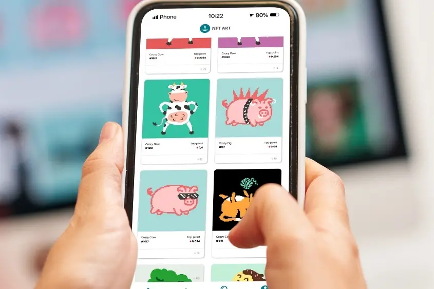 What is NFT? Picture of someone browsing an NFT marketplace on their phone.