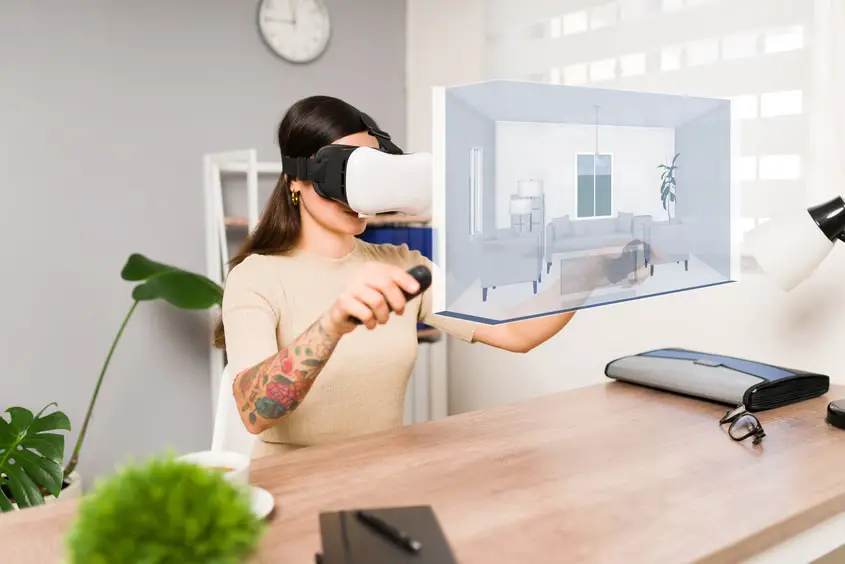 A women viewing virtual property using VR technology.