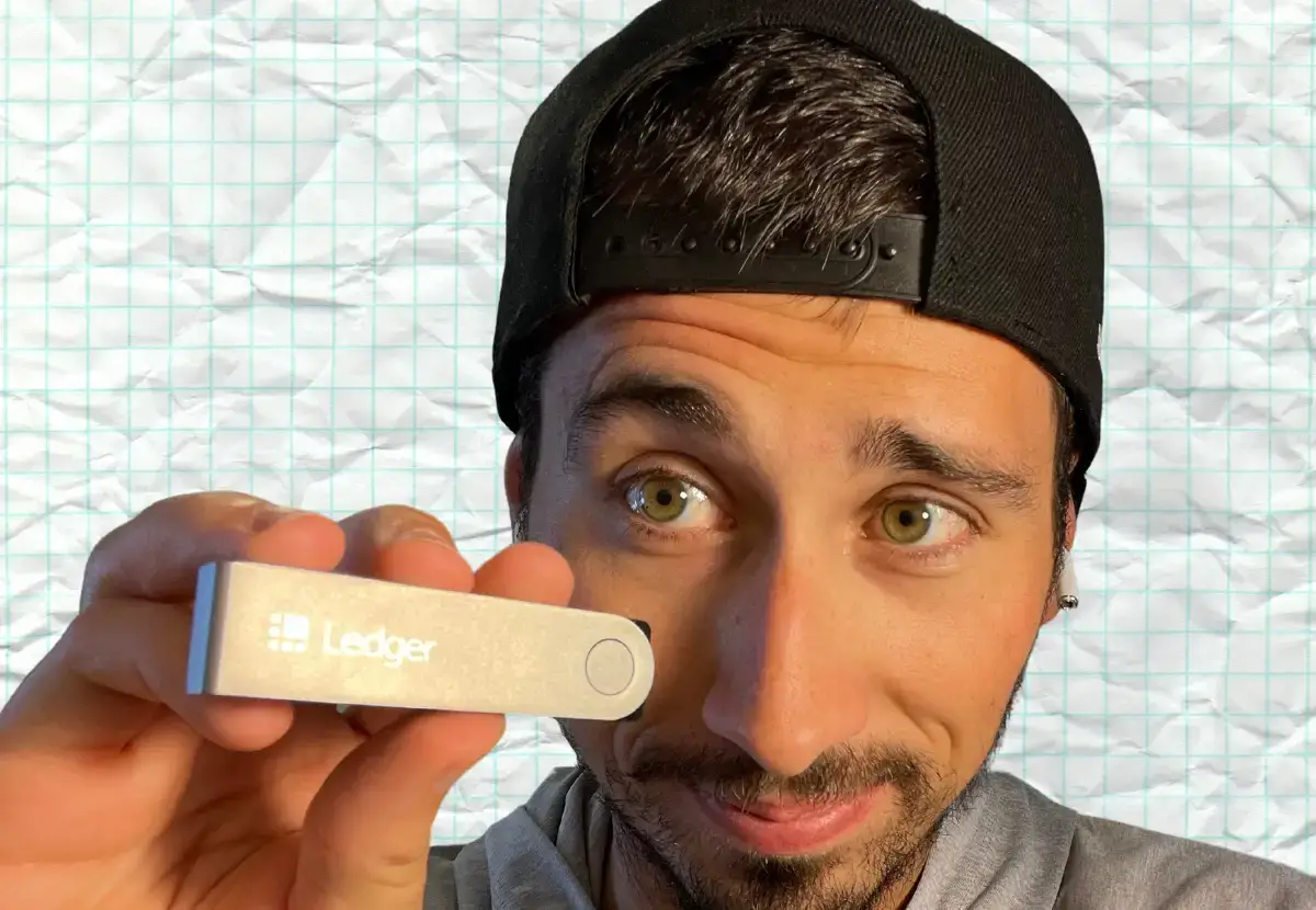 Holding my Ledger Nano X hardware wallet.